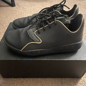 Jordans Black and Gold Sneakers